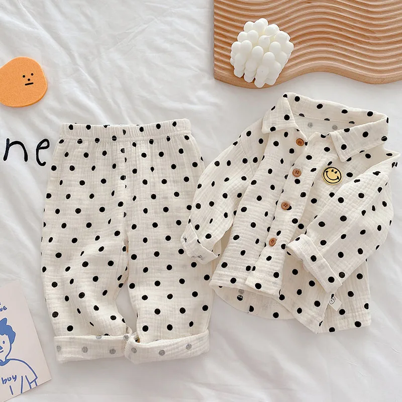 Gewaden Milancel 2021 Herfst nieuwe baby pyjama set linnen jongens slaper slijtage meisjes slaapset smile gezicht kleding