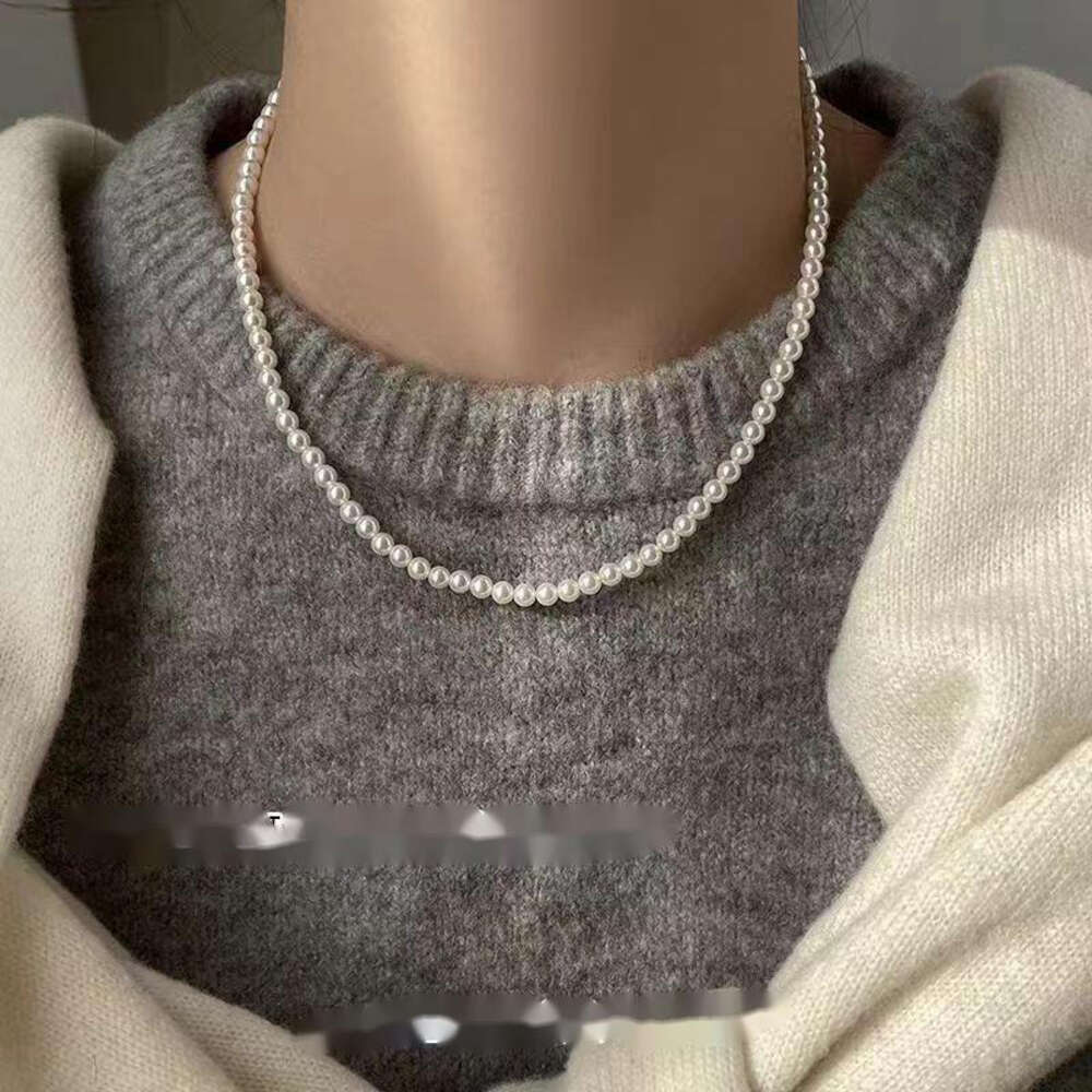 Swarovski Necklace Pendant Necklaces White Magnetic Buckle Round Pearl Necklace For Women New Layered Sweater Chain Light Luxury Style Neck Chain