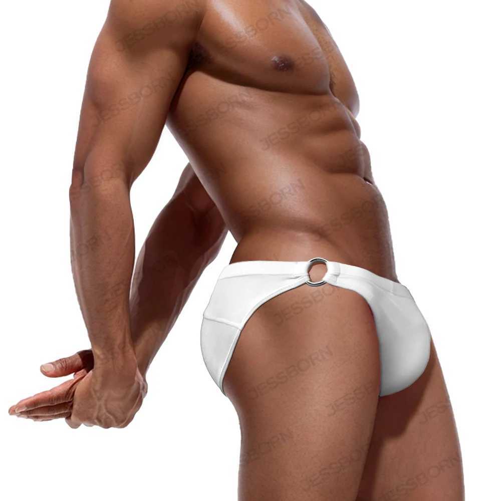 Mäns badkläder Sexig herr dubbel metallring Swim Briefs låg midja bikini surf badkläder nylon gay påse kudd push up baddräkt fast baddräkt d240424