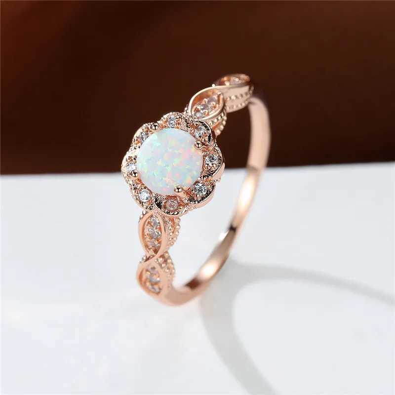 Bröllopsringar Kvinnliga söta blommaengagemang Rose Gold Color Wedding Ring White Opal Round Stone Jewelry for Women