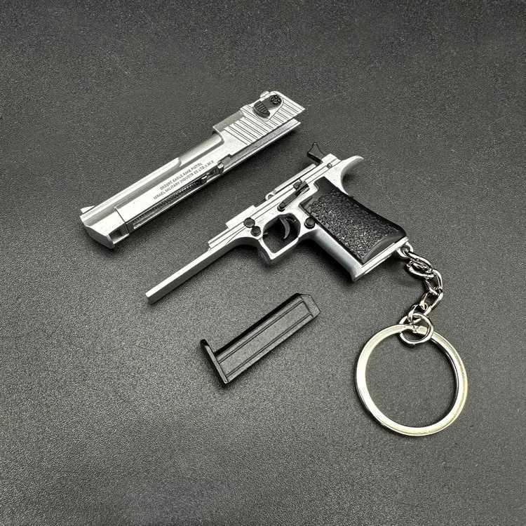 Toys pistolet Nouvel alliage 1 4 Désert Eagle Pistol Keychain Ring Fake Gun Assemble Assemble Jouet Gun Sac à pistole
