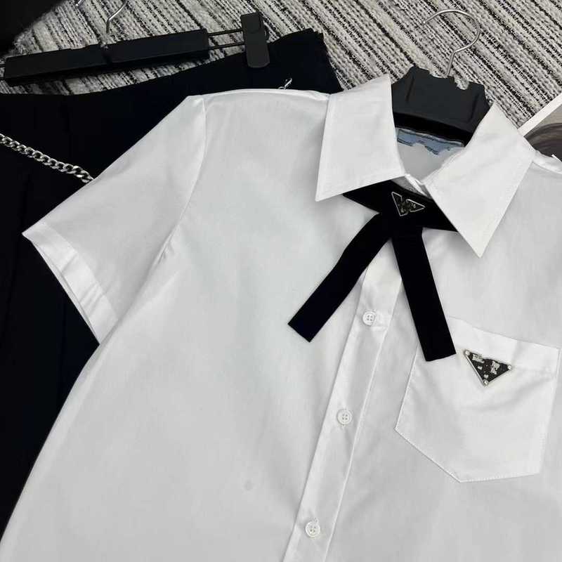 Kvinnors blusar skjortor designer tidigt vår ny västerländsk polo krage kontrast bågskjorta klassisk enkelficka inverterad triangel 58qf
