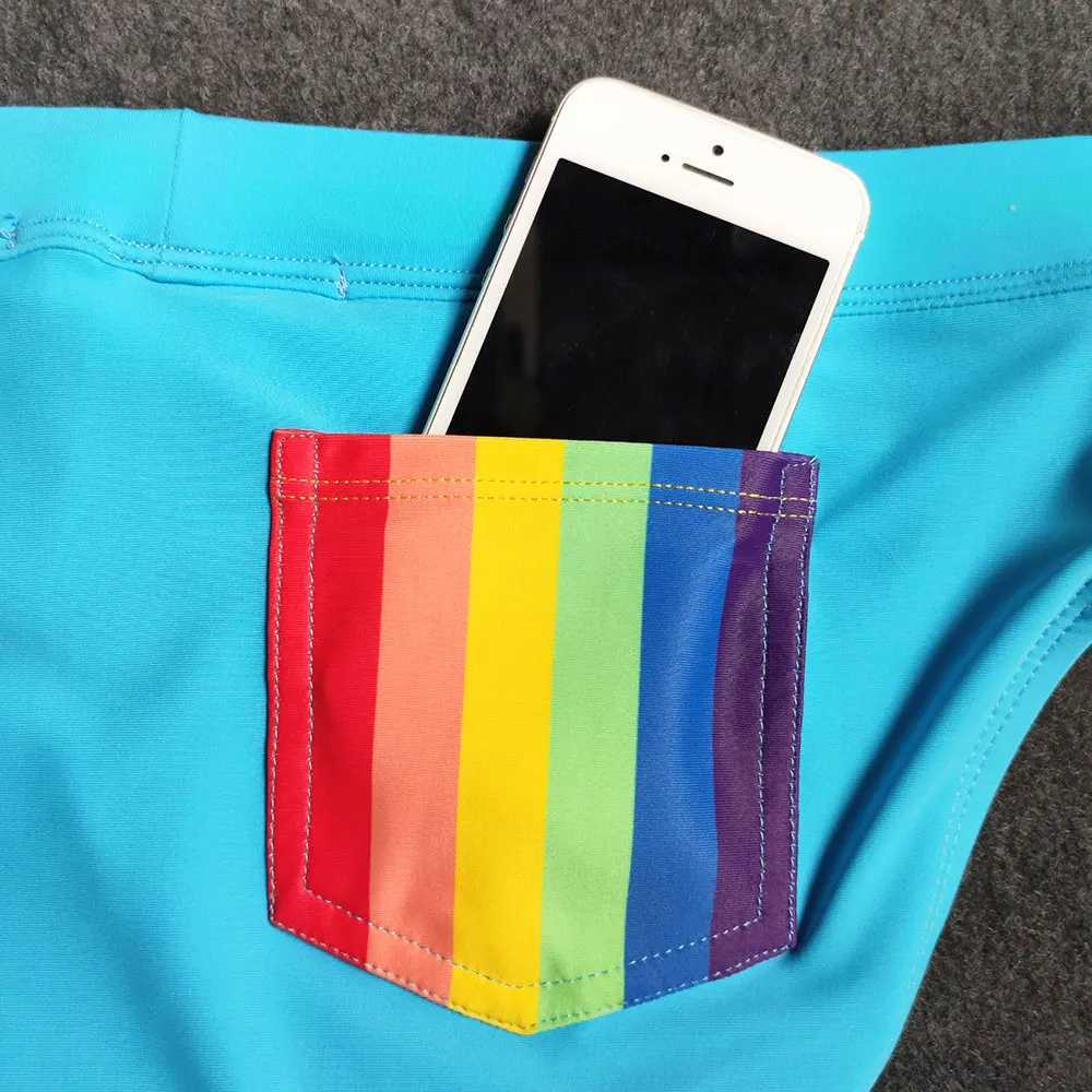 Swimwear masculin Uxh Hot Sexy Mens Swensuit Push-up Rainbow Briefes Swimwear Male Sexy Swimming Bikini Shorts Men de surface surf de surface Swim D240424