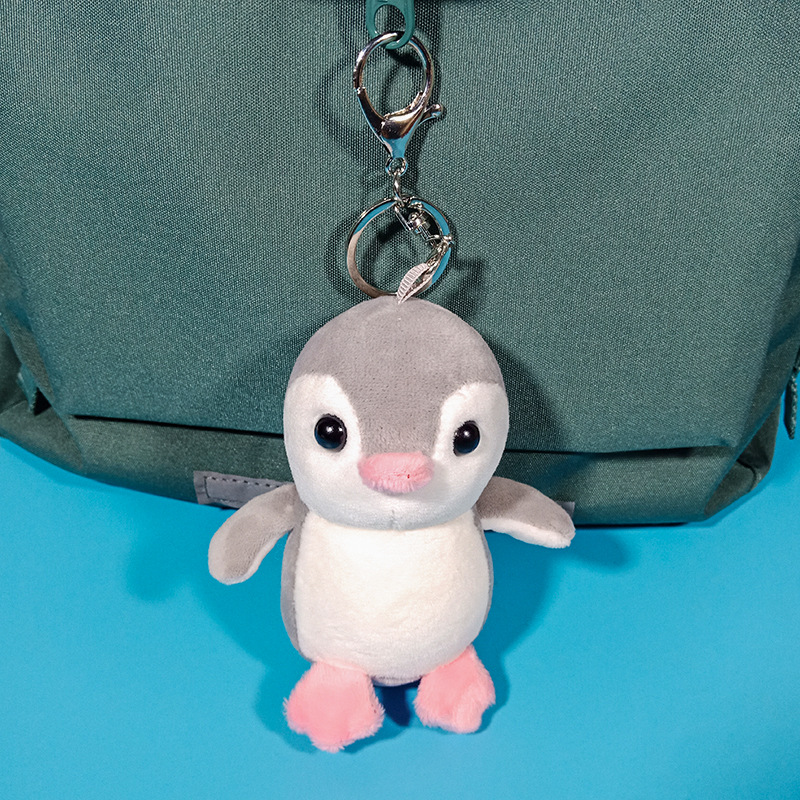 Four sided bouncing penguin doll backpack pendant ins internet celebrity cute car keychain female plush grab machine doll