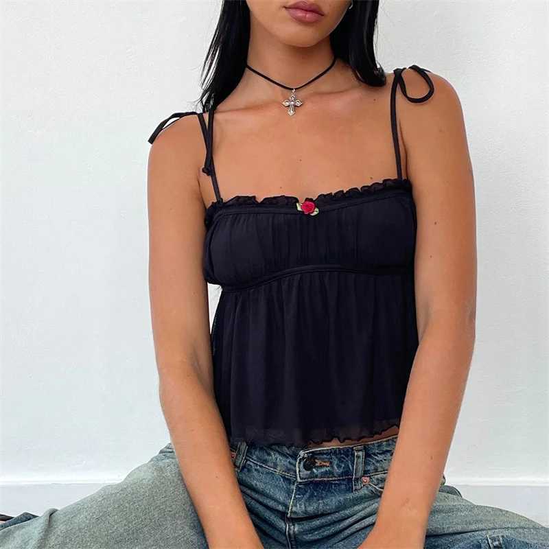 Tanks pour femmes Camis Xingqing Y2K Tops pour femmes Vêtements de fée Fleur / Bow Spaghetti Strap Slveless Pleered Camisole 2000S VIET PARTY Clubwear Y240420