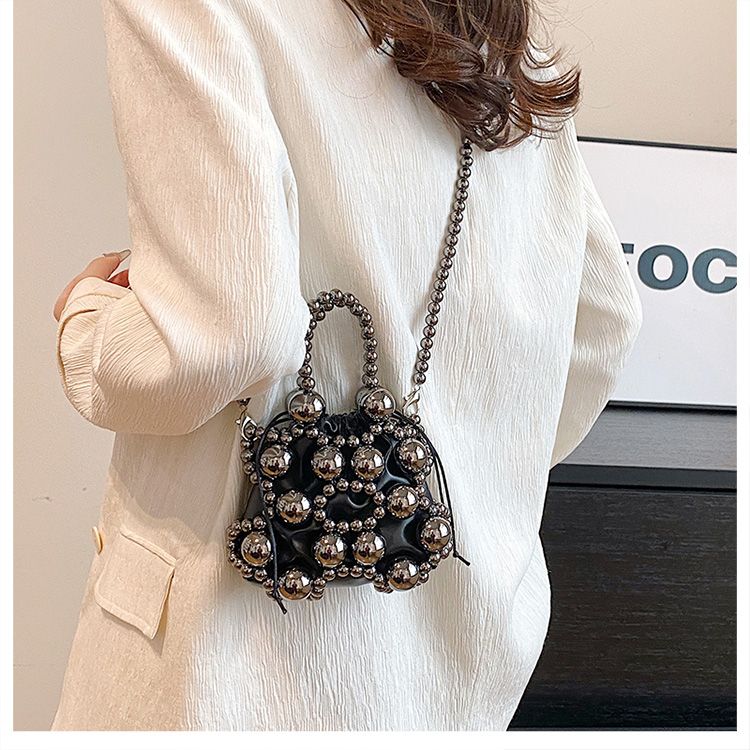 The hand carries the foreign air bag woman 2024 spring and summer new style high-grade sense banquet bag Korean version minority design single shoulder bag