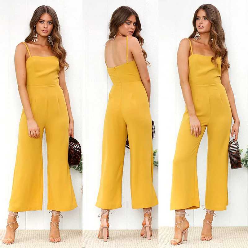 Jumpsuits voor dames rompreren dames mouwloze slabbetje dunga jumpsuit herfst casual losse massieve dames spaghetti schouderband wide been jumpsuit y240425