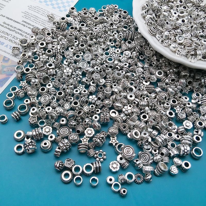 Tibetan Silver Color Alloy Flower Flee Loose Spacer Perles de forme de bijoux de fabrication de bricolage avec trou