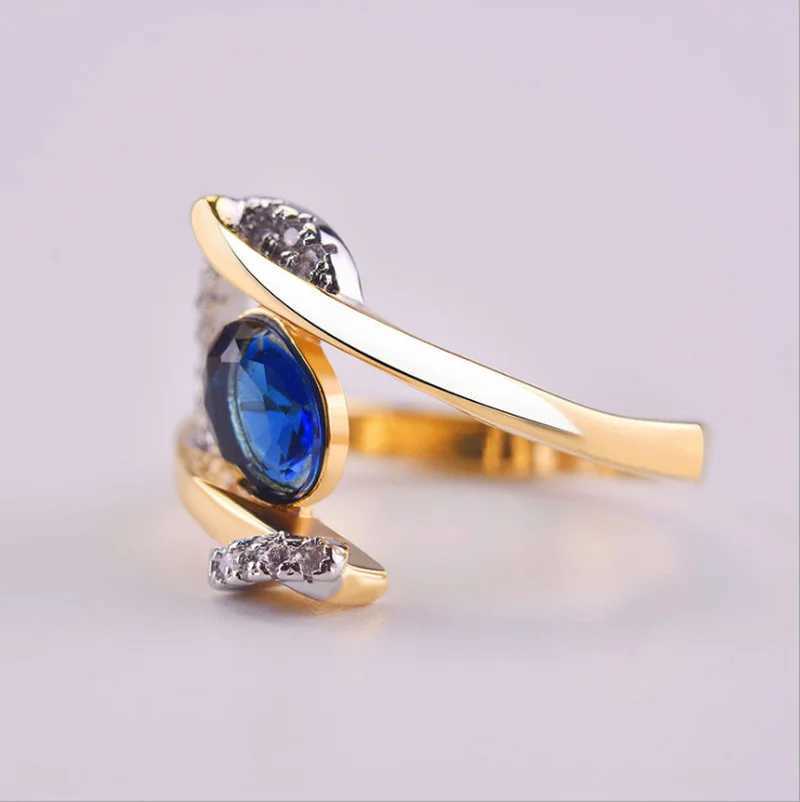 Pierścienie zespołowe kreatywne moda niebieska kamienna obrączka dla kobiet wykwintny złoty kolor inkrustowany biały kamienie cyrkonżu biżuteria zaręczynowa H240425
