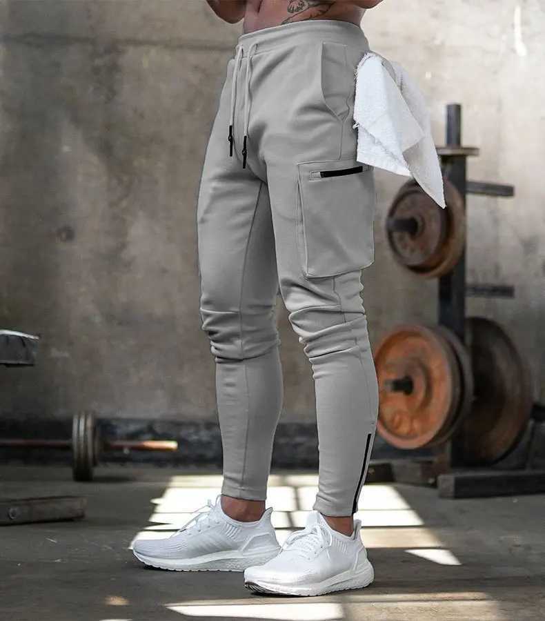 سراويل الرجال الرجال sweatpant سراويل متعددة الجيب السراويل في الكاحل السوستة للرجال الركض غير الرسمي الخريف رجال أسنانات السراويل D240425