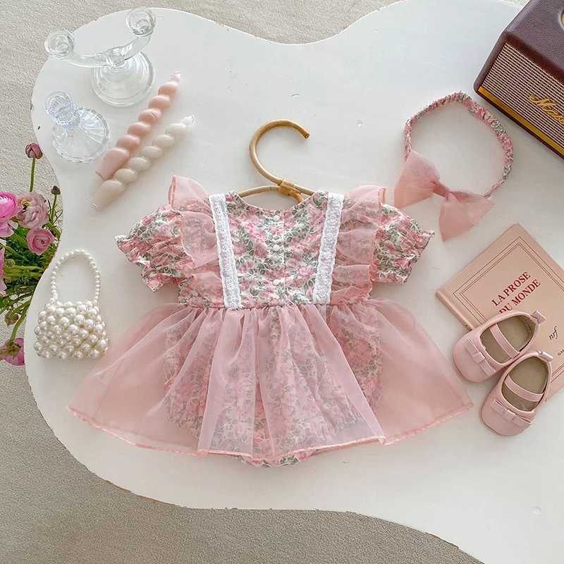 Rompers 2024 Body de bébé d'été avec bande de cheveux Sweet Puff Sleeve Baby Girls Floral One Piece First Birthday Robe H240425