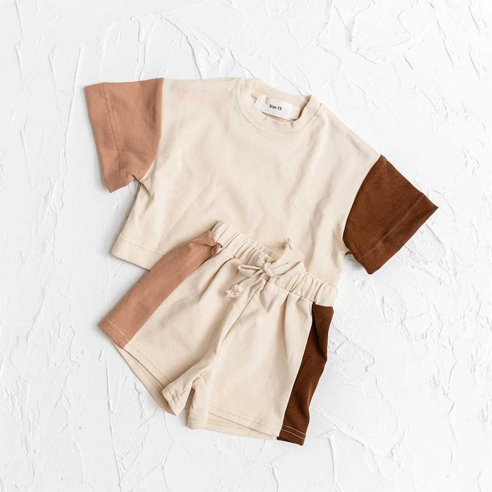 T-shirts Ny sommarbomullsmöte Kort ärm T-skjorta och shorts Set Baby Boys Girls Clothing Color Casual Tops Outfits L2404