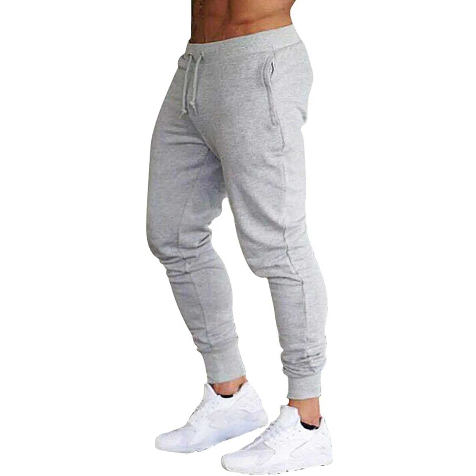 Pantalon masculin 2024 Nouveau pantalon d'automne hiver / femmes Pantalons de course joggers joggers Sweatpant sport pantalon décontracté gymne