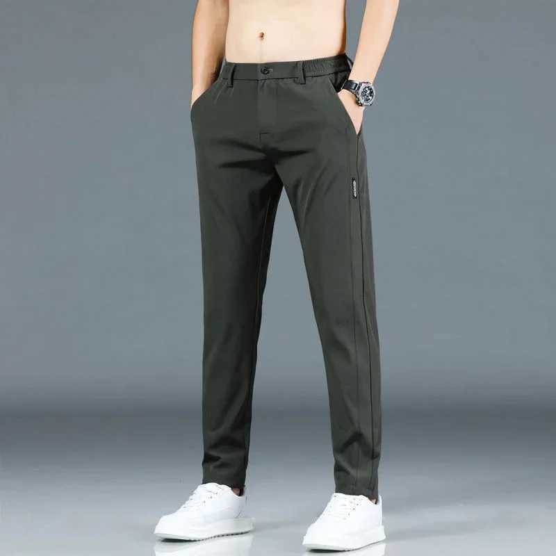 Pantaloni da uomo 2024 pantaloni da uomo slim codi maschile coreano pantaloni sportivi il piacere traspirato