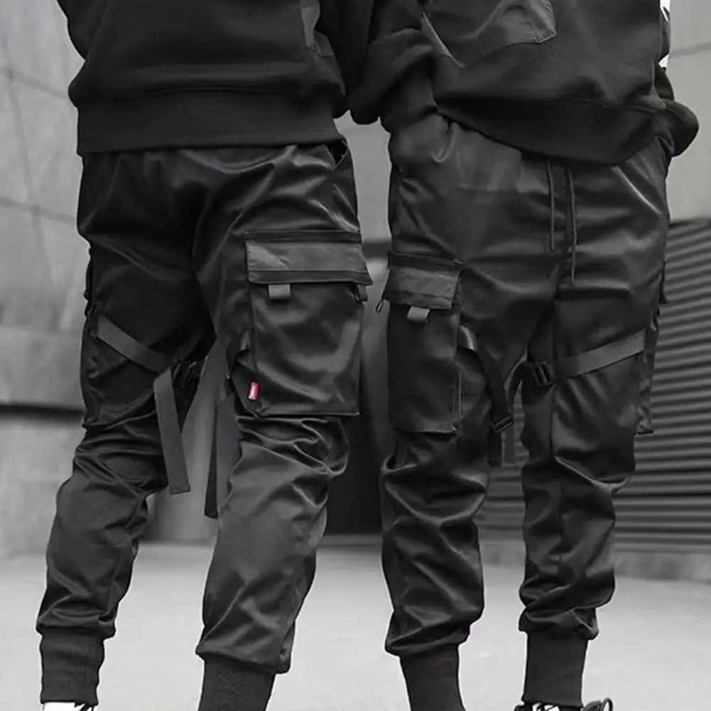 Herenbroek mannen broek vaste kleur multi -zakken slanke enkel vastgebonden middenstijging laadbroek voor lente zwarte broeken mannelijke casual broek d240425