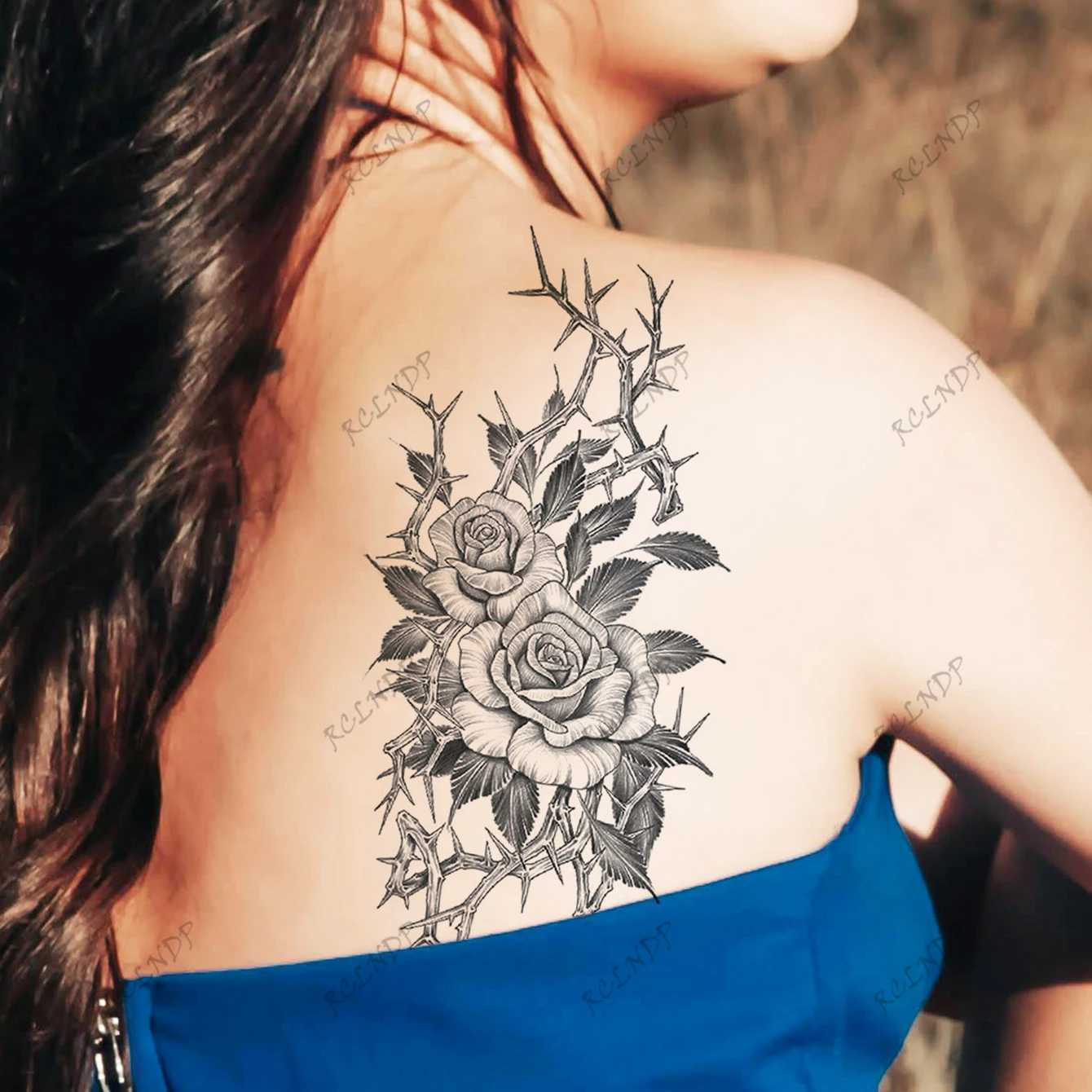 Transfer tatuaggi 2 pezzi impermeabili di adesivi da tatuaggio temporaneo che disegna fiori e spine tatto finto flash tatoo cosce di braccia tatuate donne 240426