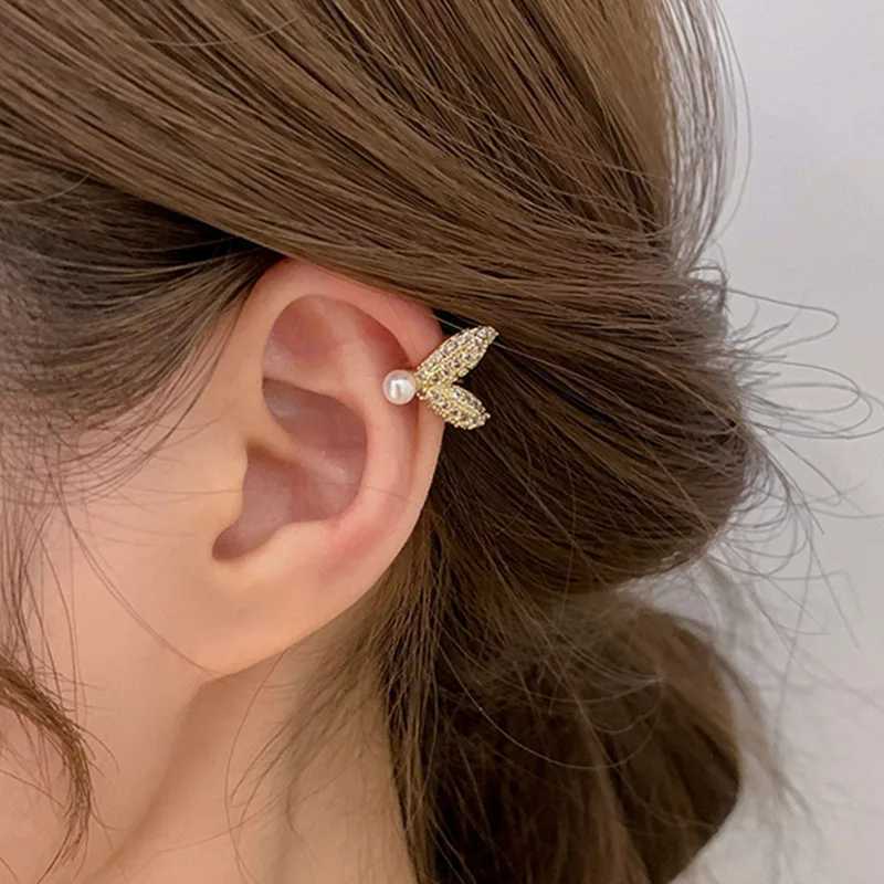 Encanto imitación coreana perlas penetrante falso anillo de oreja de sirena para mujeres niña de moda