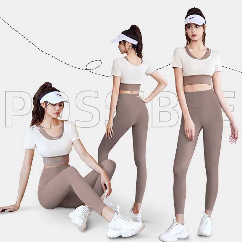 Les survêtements féminins d'automne élastique de fitness sports 2 pièces de yoga sans couture ensemble pour les femmes à manches à manches à manches à manches à manches à manches à manches à manches à manches à manches à manches à manches à manches courtes