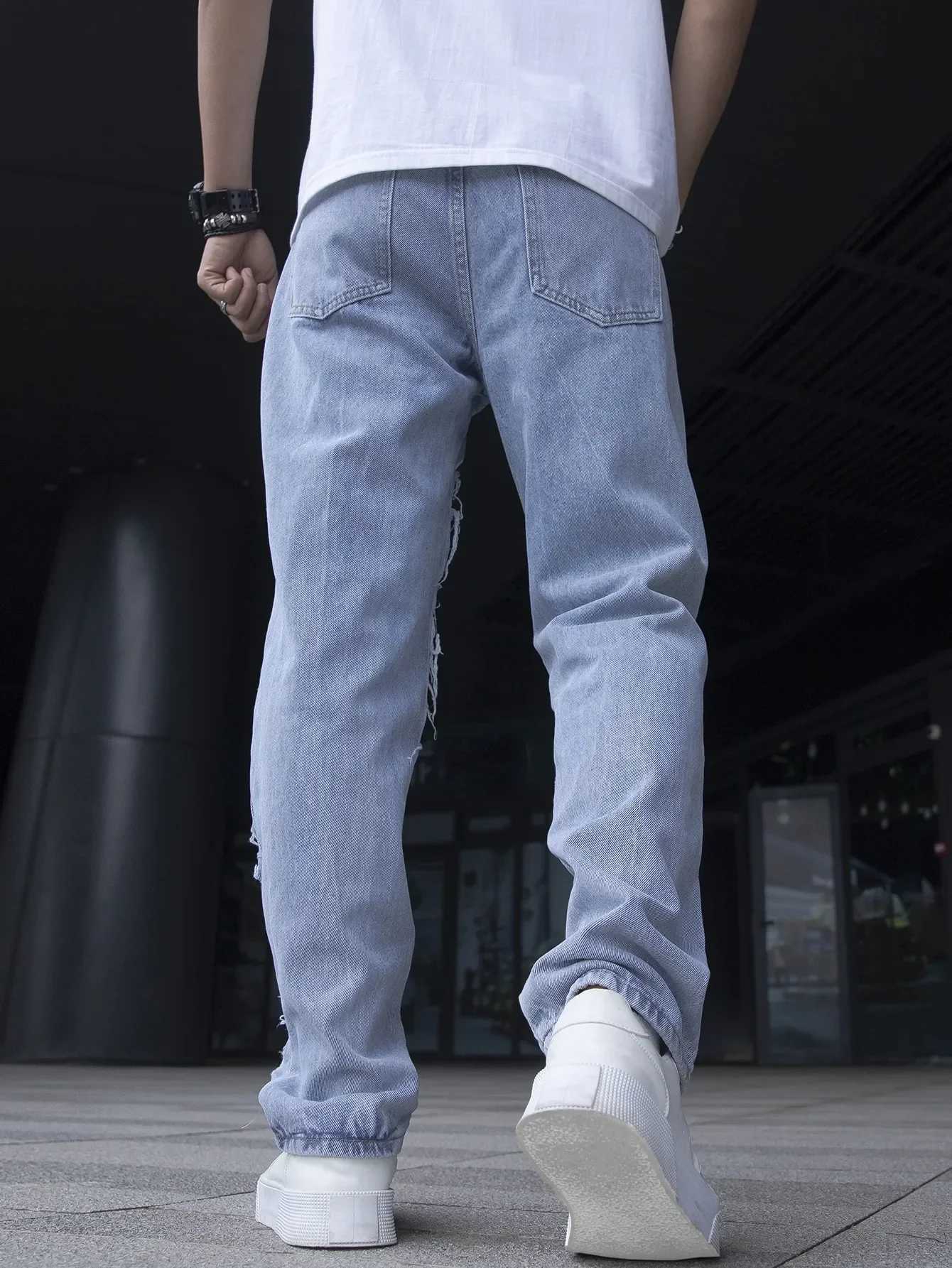 Męskie dżinsy męskie pęknięte elastyczne dżinsy Modne ubrania uliczne dziury łzowe i patchworkowe dżinsowe spodnie ultra-cienkie męskie ciasne dopasowanie JeanSl2404