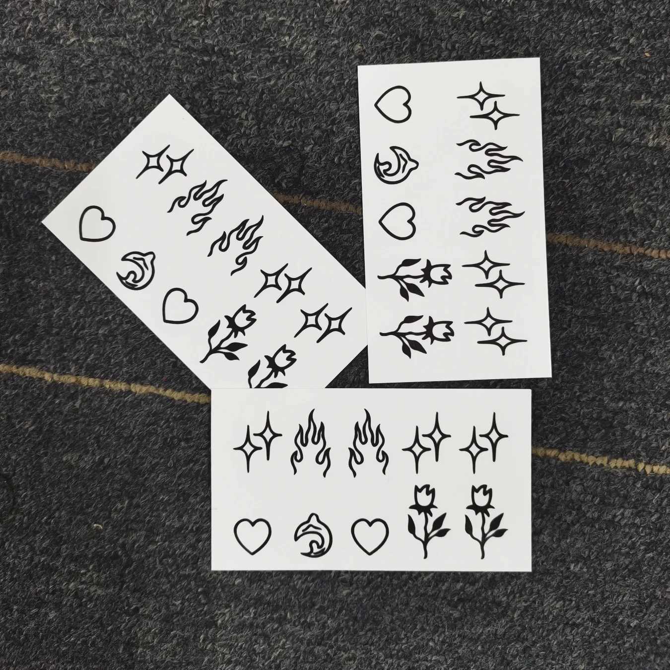 Tattoo -overdracht Waterdichte tijdelijke Tattoo Sticker Flame Love Heart Flower Star Selfie Body Art Fake Tatto Flash Tatoo on Finger for Men Women 240426