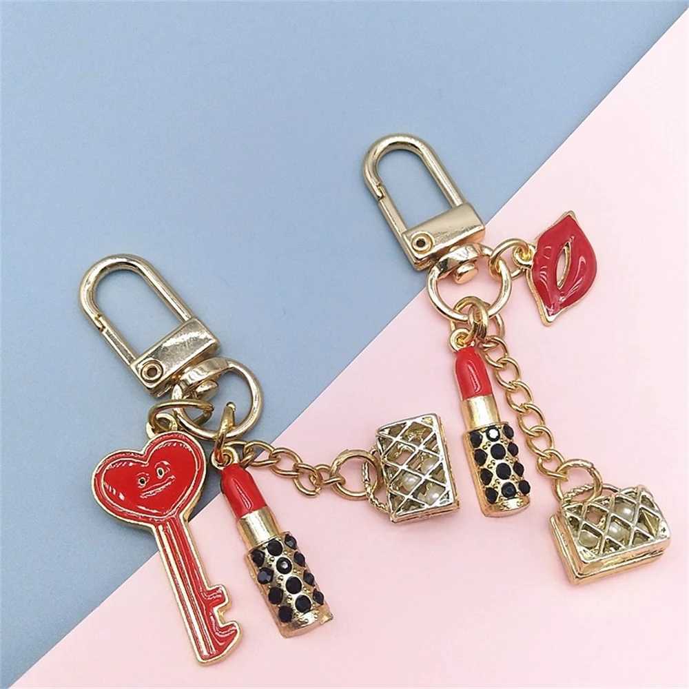 Nyckelringar Lanyards Nya läppstift Läppar Keychain med svarta strass Nyckelring Delikat Metallhänge Charms för Women Girl Bag biltillbehör