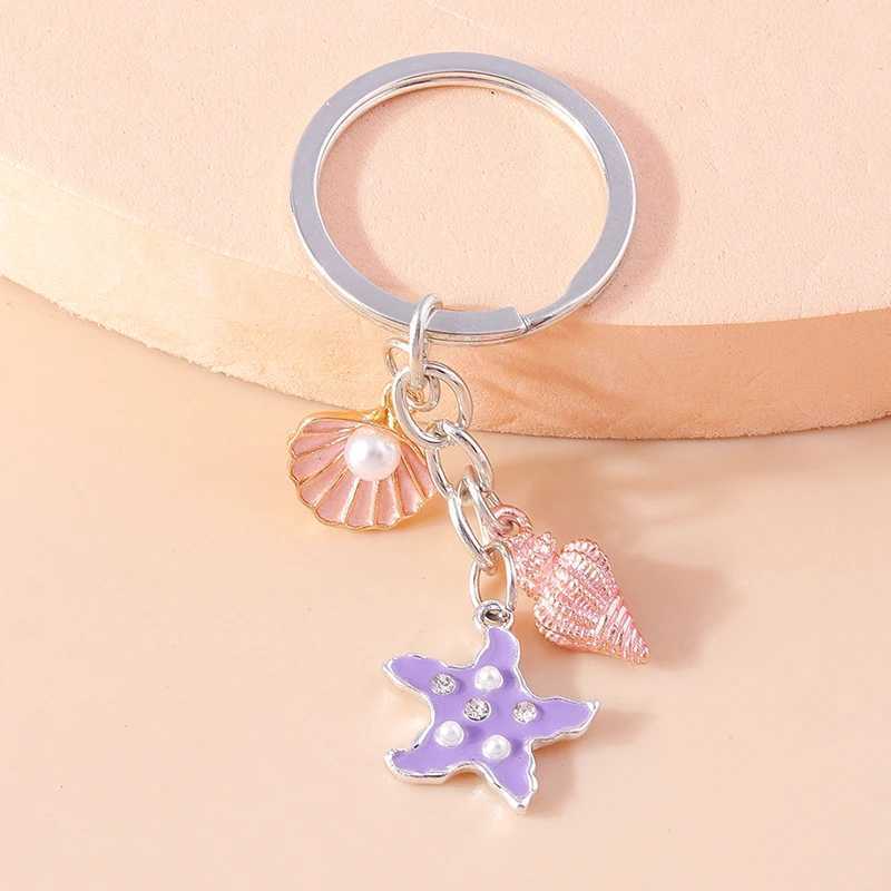 Keychains Lanyards süße Schlüsselanhänger Emaille Sommer Beach Seestarfish Muschel Anhänger für Frauen Männer Auto Schlüssel Handtasche Anhänger Schlüsselketten DIY -Geschenke