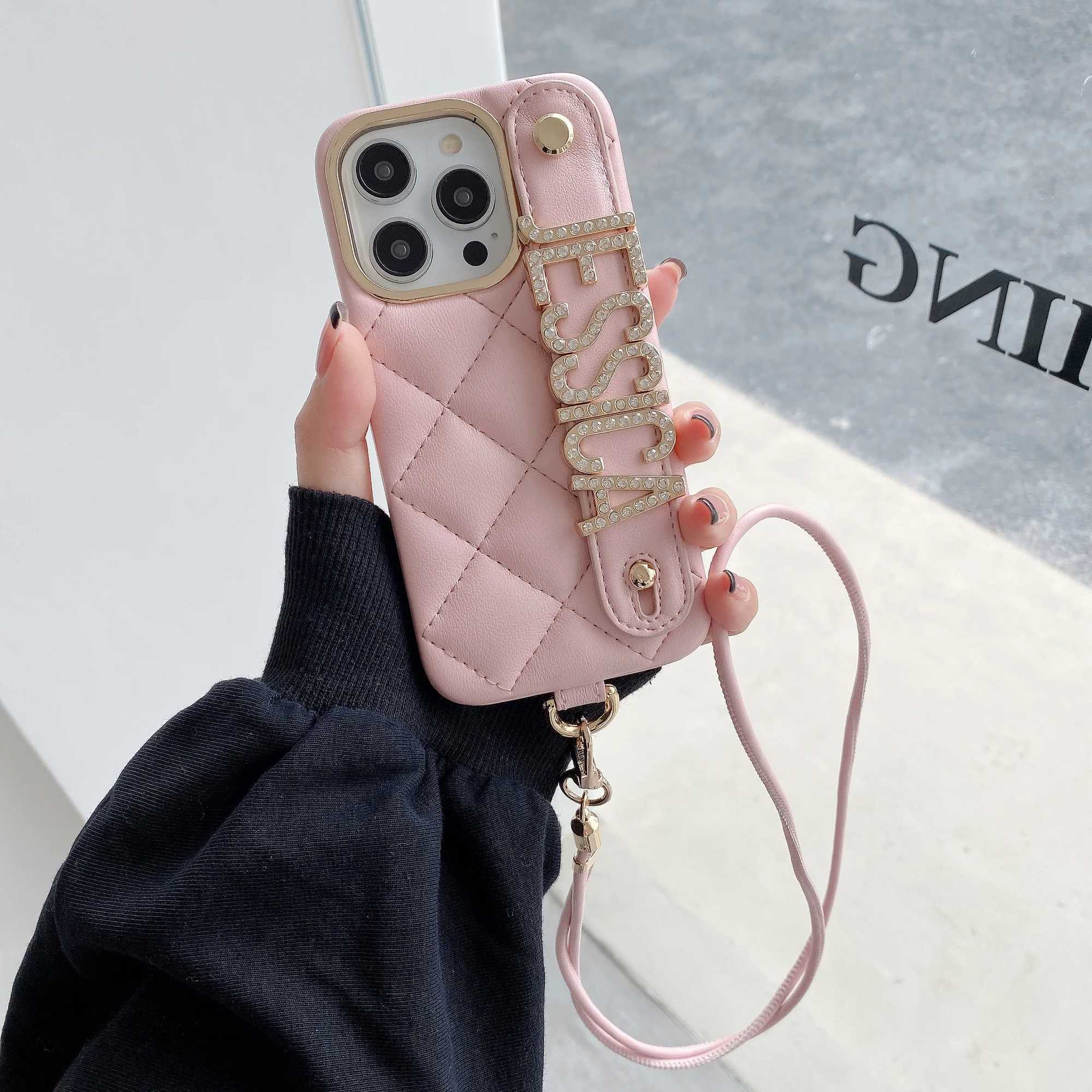 Cell Phone Cases Luxury diamond leather phone case wristband with customized name letters iPhone 15 14 13 11 ProMax personalized cross system rope phone c J240426