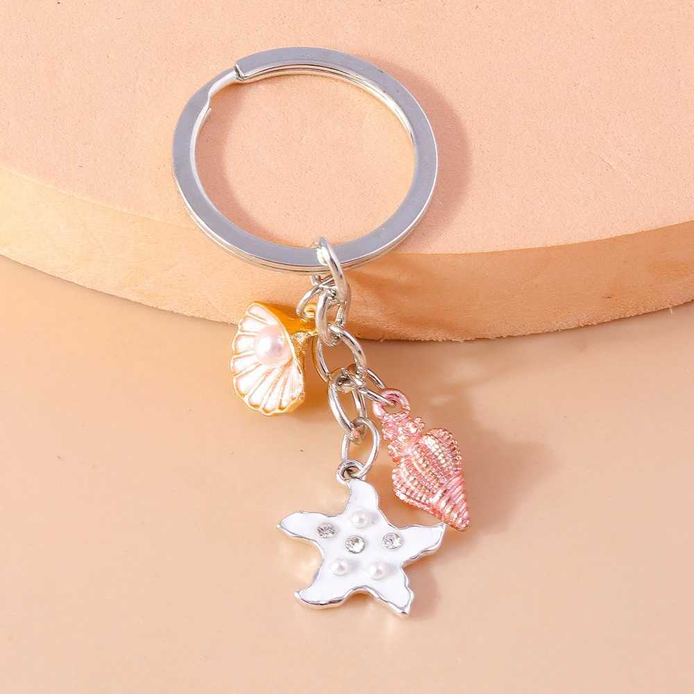 Keychains Lanyards süße Schlüsselanhänger Emaille Sommer Beach Seestarfish Muschel Anhänger für Frauen Männer Auto Schlüssel Handtasche Anhänger Schlüsselketten DIY -Geschenke