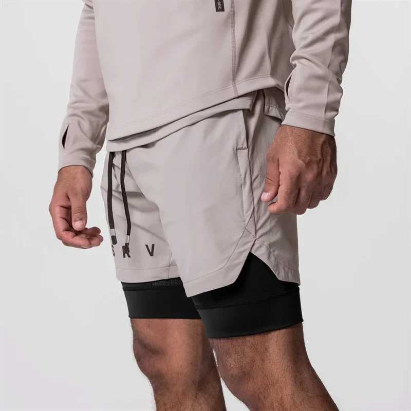 Mäns shorts nya män shorts sport fitness 2-i-1 snabbtorkande andningssträcka dubbelskikt shorts joggers gym körträning byxor d240426