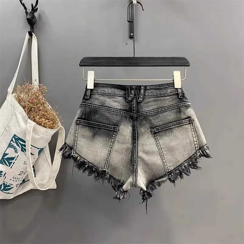 Dames shorts 24 Nieuwe Koreaanse sexy buitshorts High Taille Tassel A-Line Super Shorts Ragged Randen Stretch Cowboy Denim Shorts Women Y240425