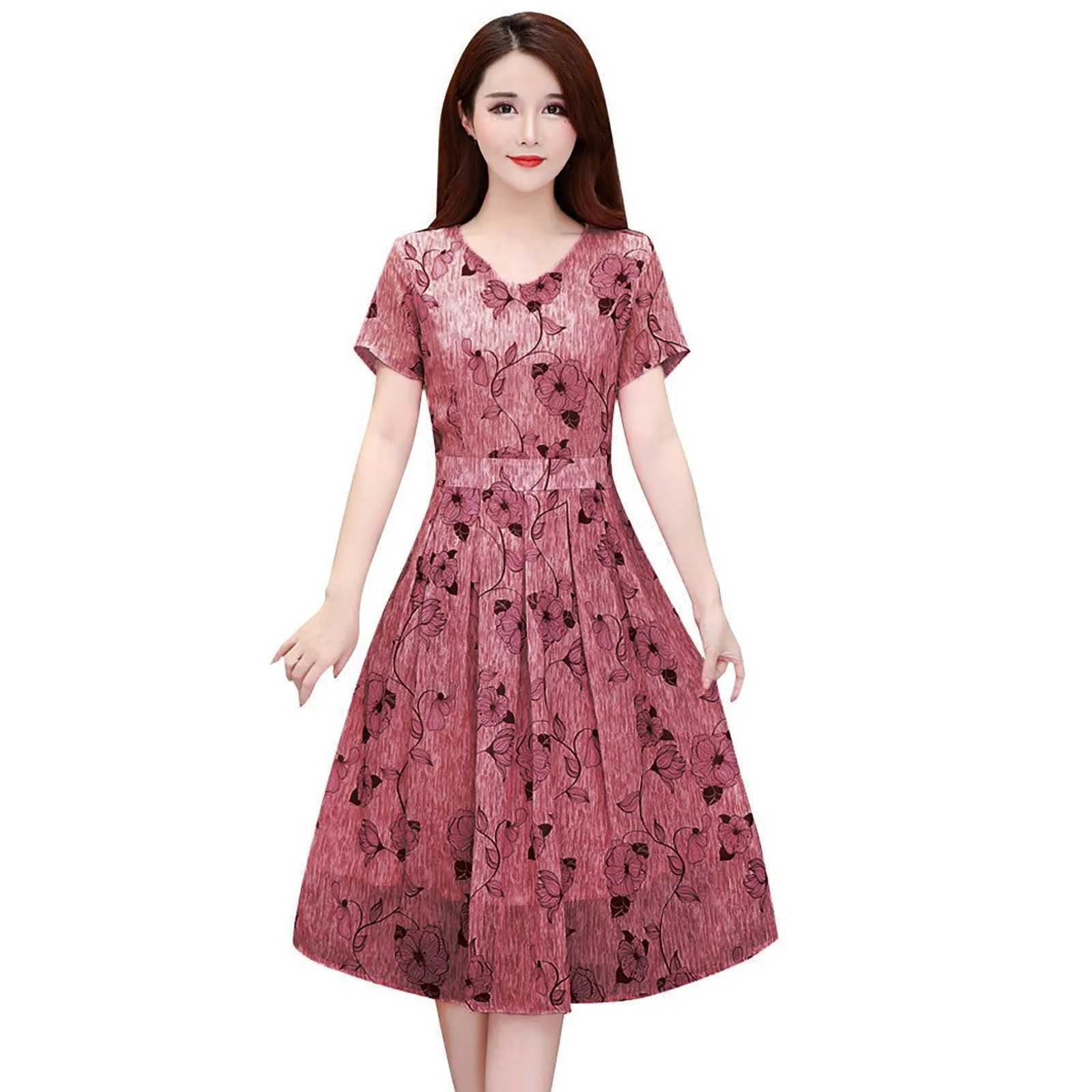 Grundläggande avslappnade klänningar Casual Floral Printed V-ringklänning Kort ärm A-Line Swing Dress Elegant Party High midjeklänningar för kvinnor Vestidos Hot Sale