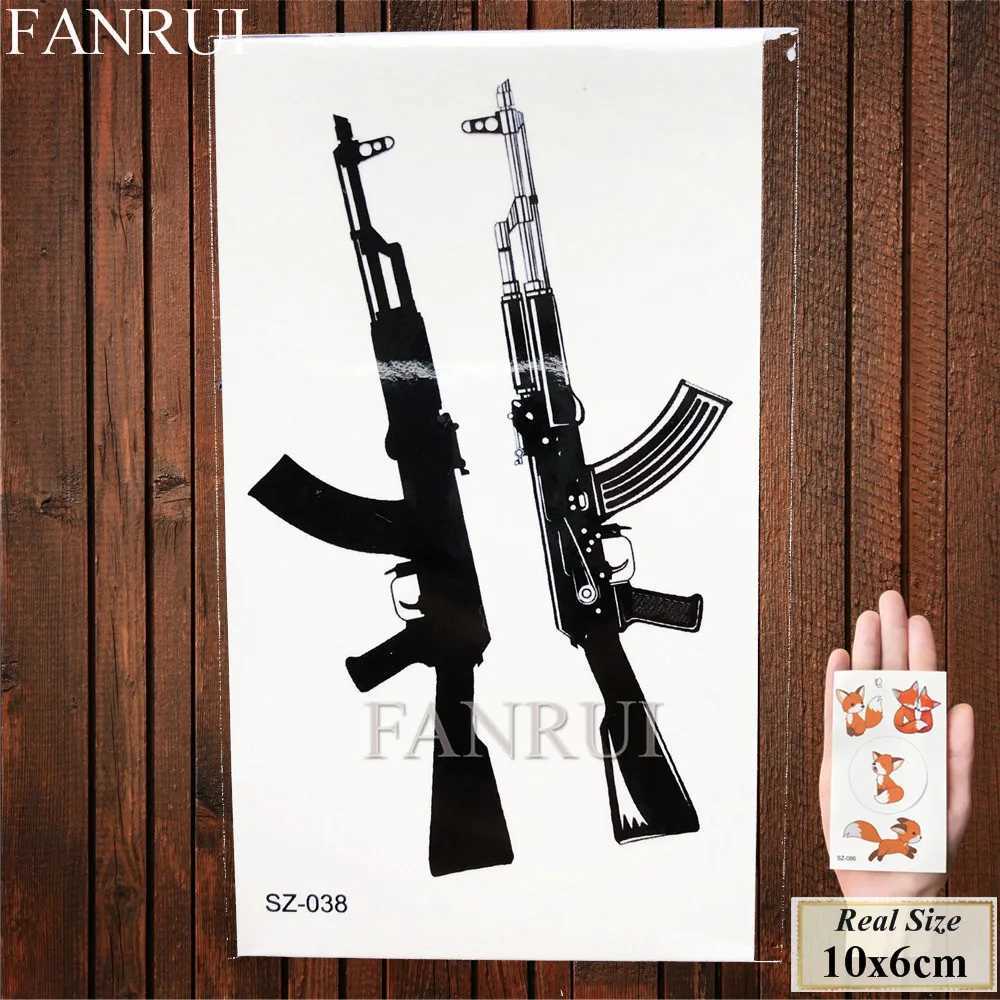 Transfert de tatouage fanrui sexy pistolet ak47 ak tatouage temporaire hommes arm armound champs pubg arme tatouons autocollants femmes fausses tato imperméables 240426