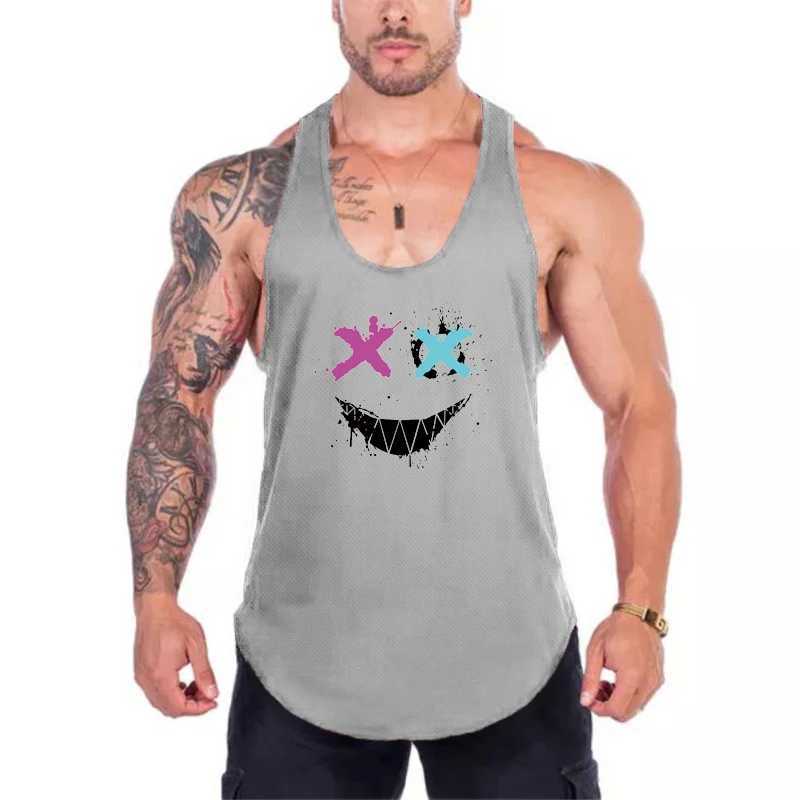 Men's Tank Tops Fashionable and humorous XX smiling face fitness vest mens bodybuilding sleeveless vest mesh quick drying racing back T-shirtL2404