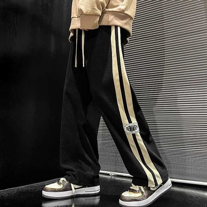 Pantaloni da uomo a strisce vellutoy gamba larga da uomo 2023 pantaloni da carico hip-hop coreano le pantaloni da corsa esterni sport di dritta casual