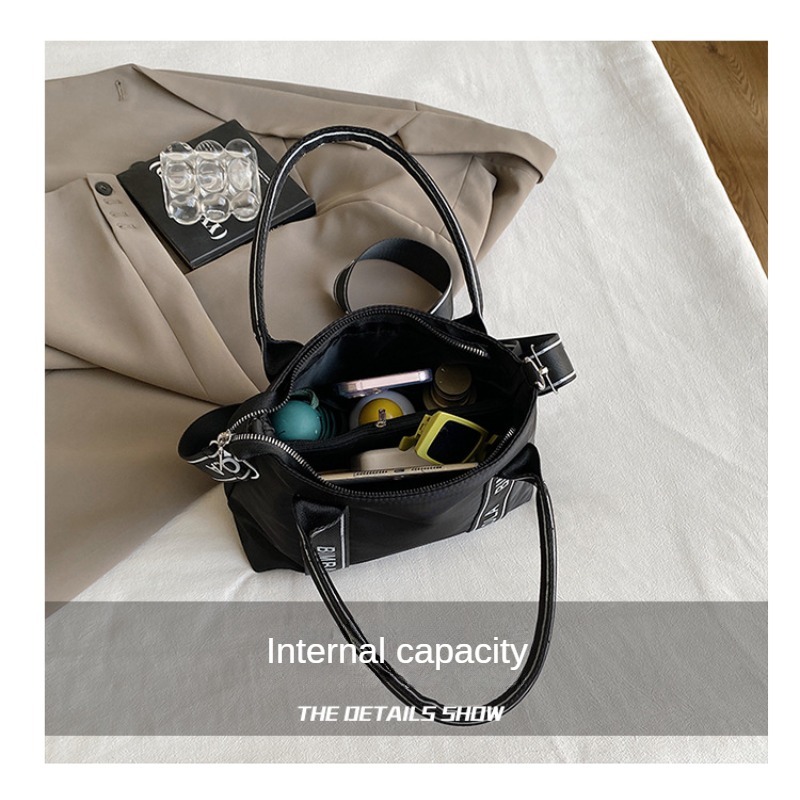 Spanish Niche Design Nylon Large Capacity Tote Bag Luxury Handbag for Mens Crossbody Bag Trendy Commuting Outdoor Leisure Womens Shoulder Bag