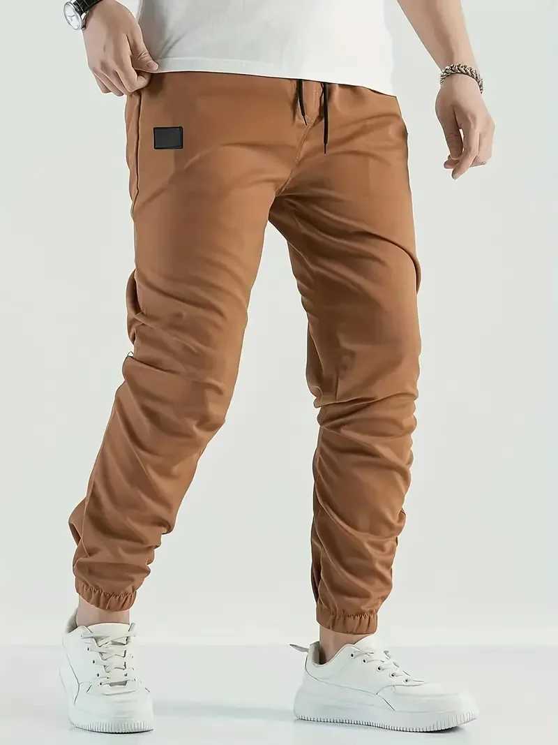 بنطلون الرجال 2024 New Jogger Cargo Pants Mens Harem Pants Hip-Hop Casual Multi Pocket Mens Pants Mens Sportsl2403