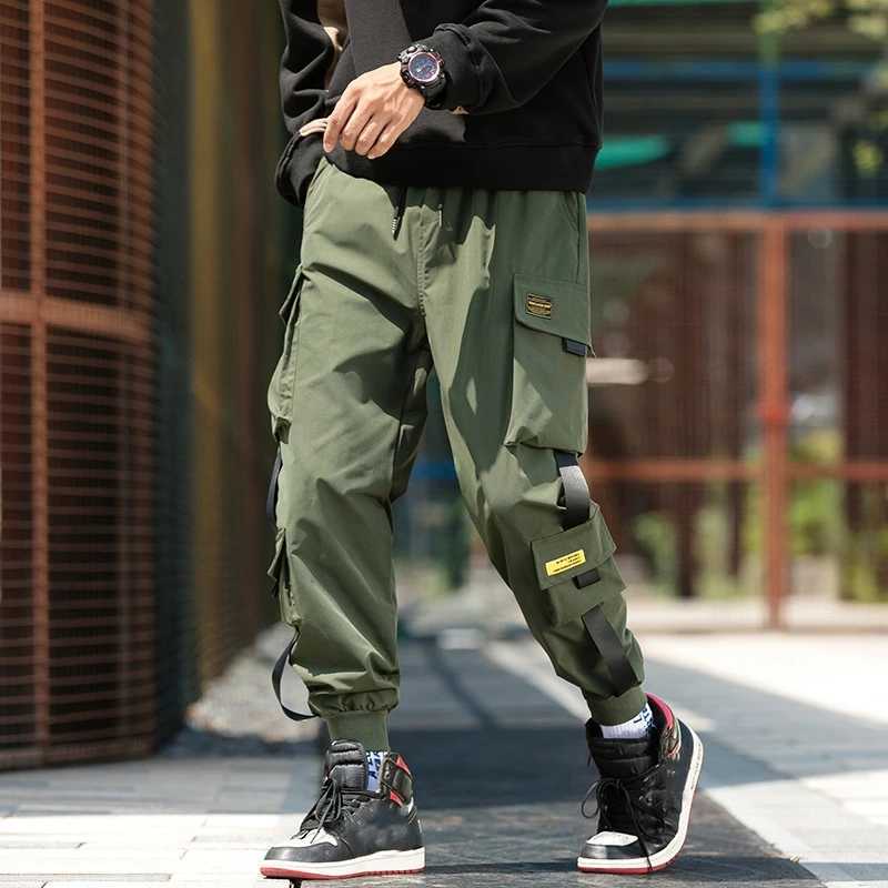 Spodnie męskie Nowe spodnie odzieży roboczej Spodnie Polityjskie Hip-Hop Hits Kolorowe multi kieszeni spodnie uliczne bluza sportowa 2404