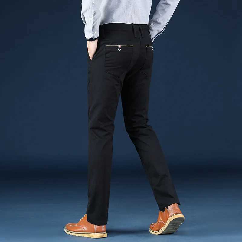 Mäns byxor 2024 Nya koreanska herrar avslappnade elastiska byxor ultralim fit byxor hög kvalitet rak elastiska byxor l2404