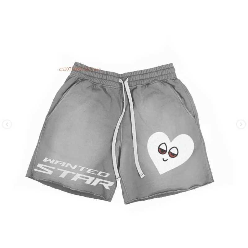 Shorts maschile Shorts Sholds Shorts Mens Cotton Letter Design del cuore Pesca Coppia Cinque paia di moda americana sciolta Q240427