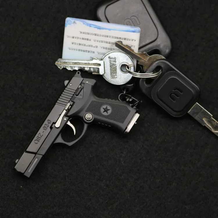 Оружейные игрушки 1 3 раковины, бросающие оружие мини -модели QSZ92, полуголосовые игрушки Съемный игрушечный орнамент подвесной пистолет для взрослых T240428 T240428