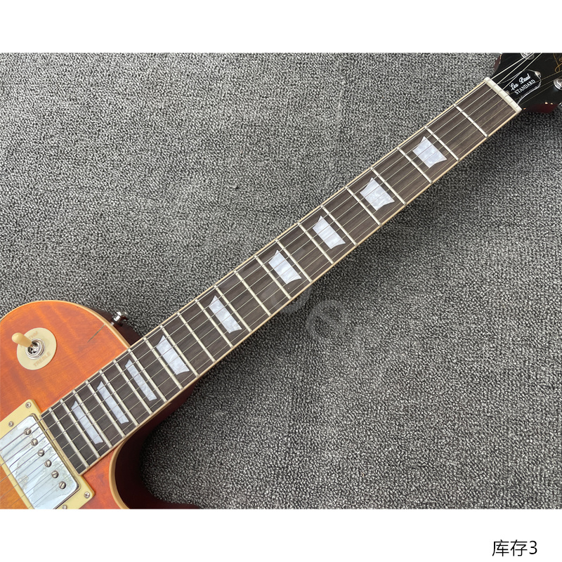 Kous! Elektrische gitaar Oranje vlam Burst Top relikwie met speciale scheurlijnen kop verouderde lijn niet echte scheurlijnen Chrome onderdelen kleine pinbrug