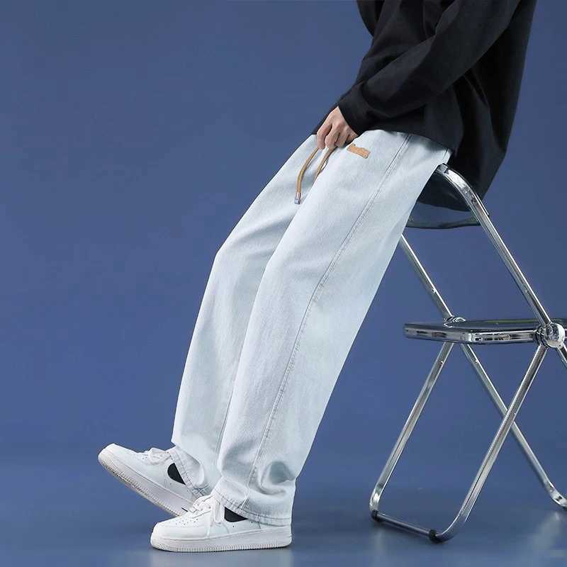Calças masculinas 2024 Novo masculino Summer solto calças de perna larga larga calças masculinas Modelo casual de perna larga Pantsl2403