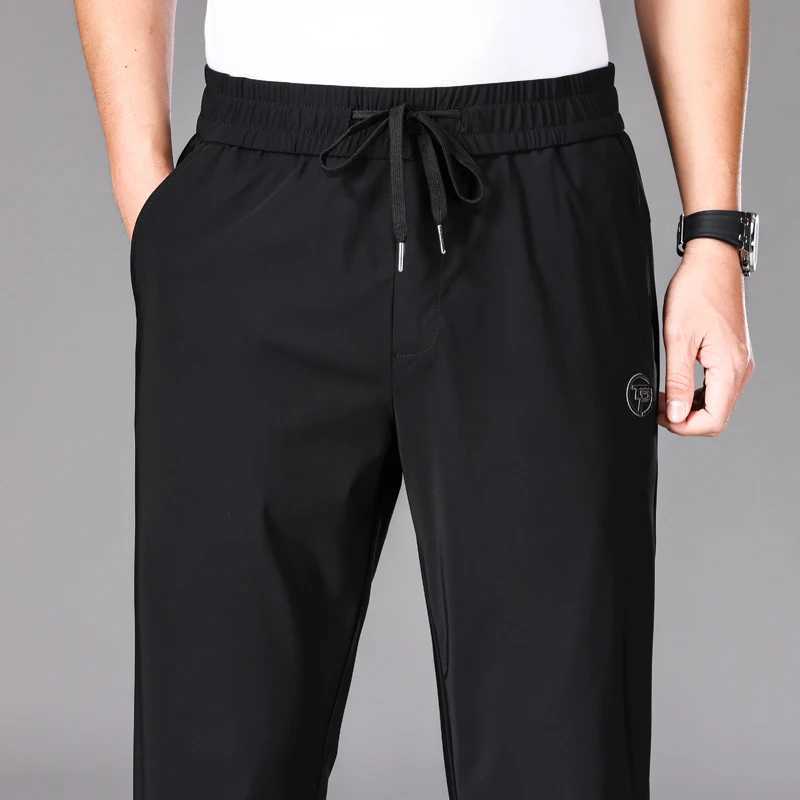 Pantalon masculin 2024 Été Nouveau homme mince travail décontracté travail respirant et confortable jogging élastique élastique Q240429