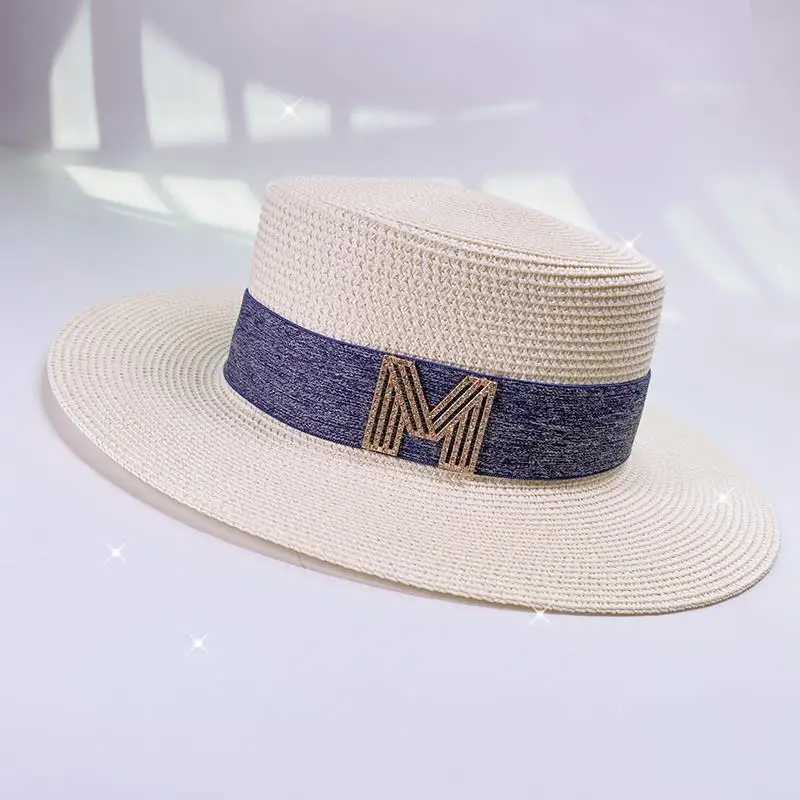Chapeaux à bord large chapeau seau Nouveaux femmes d'été Simple large bord plat top plat str hat m-label accessoires de plage du soleil