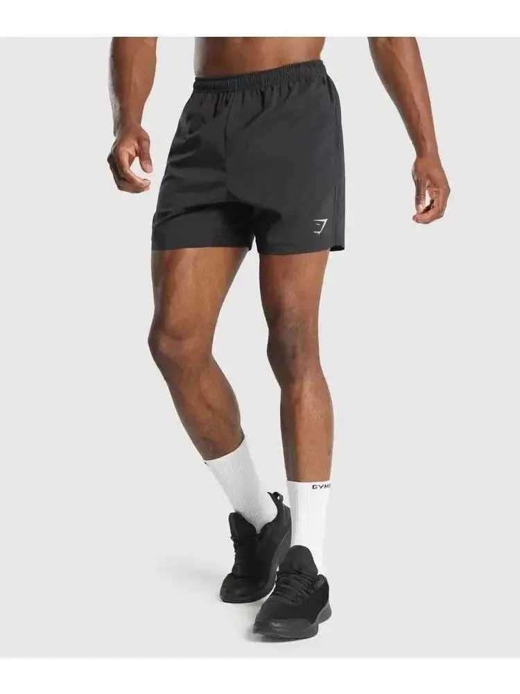 Short masculin quatre quarts de short américain exercice de fitness pour hommes