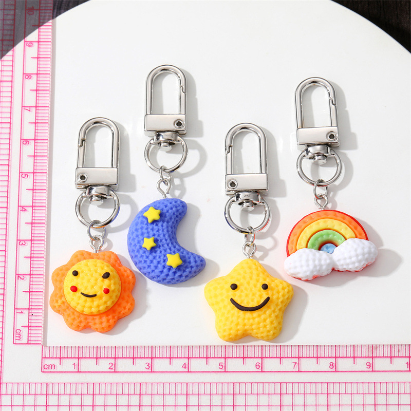 Süßer Regenbogen Sonnenstar Mond Gesicht Tastatur Karton Kawaii Keyring für Frauen Männer Kinder Freund Tasche Auto Airpods Box Telefon Charme Schmuck Schmuck