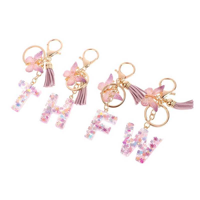 Клавичные шнурки A-Z Fantasy Sequin Letter Letter Women Womens Tassel Butterfly Подвеска оригинальная клавишная кошелька подвесная сумка очаровательный автомобиль Q240429