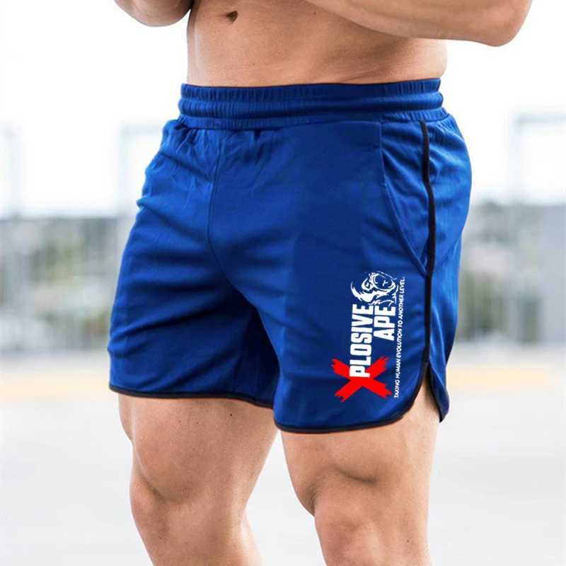 Shorts masculins Été Nouvelle tendance décontractée cordon de crampons pour hommes shorts sportifs minces mince séchage rapide et décontracté ruisseonnette à cinq quarts pantalons J240429