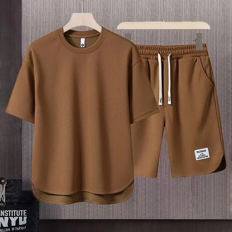 Mens coreano moda waffle due pezzi set estivo maniche corte t-shirt e pantaloncini set larghi uomo abiti firmati tute 240202