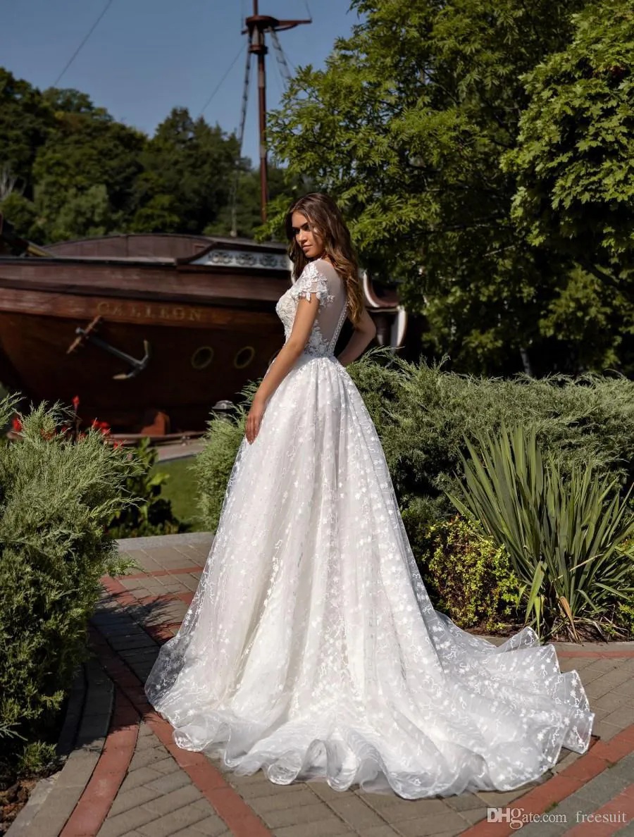Robes de mariée magnifiques pure bijou cou floral appliqué manches longues robe de mariée illusion dos volants balayage train robes de mariée